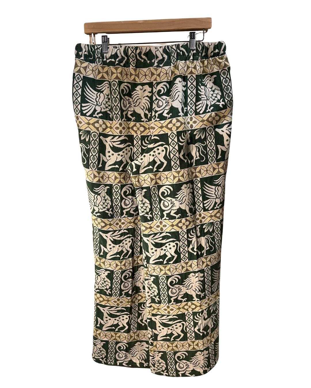 Skirt with animal pattern on a hanger against a white background