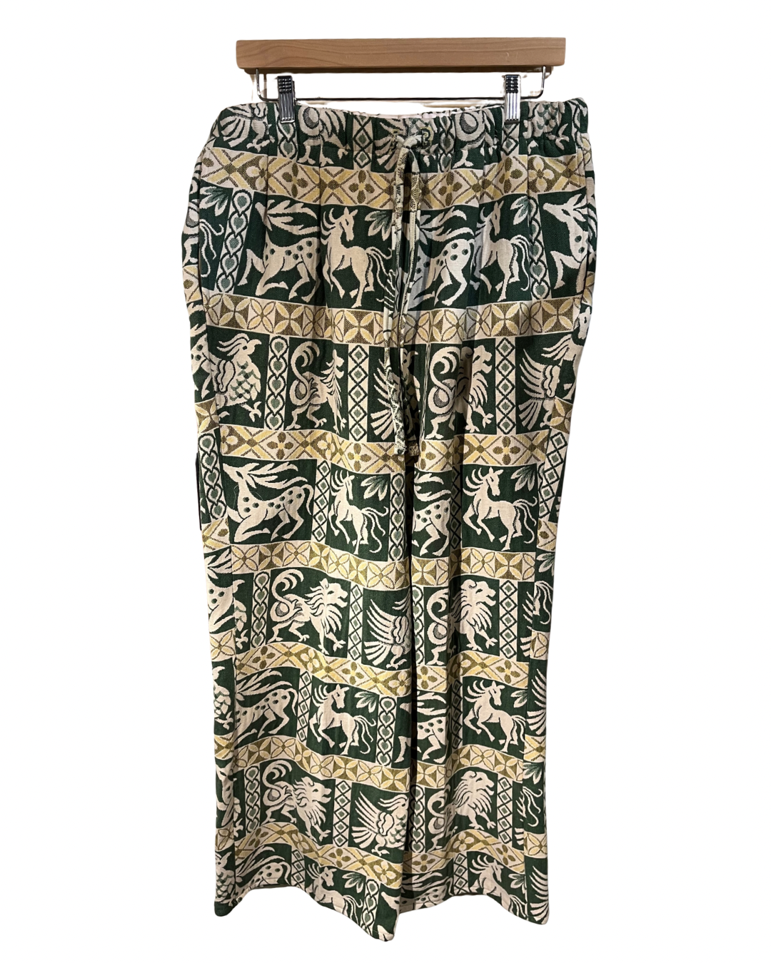 Skirt with animal pattern on a hanger against a white background