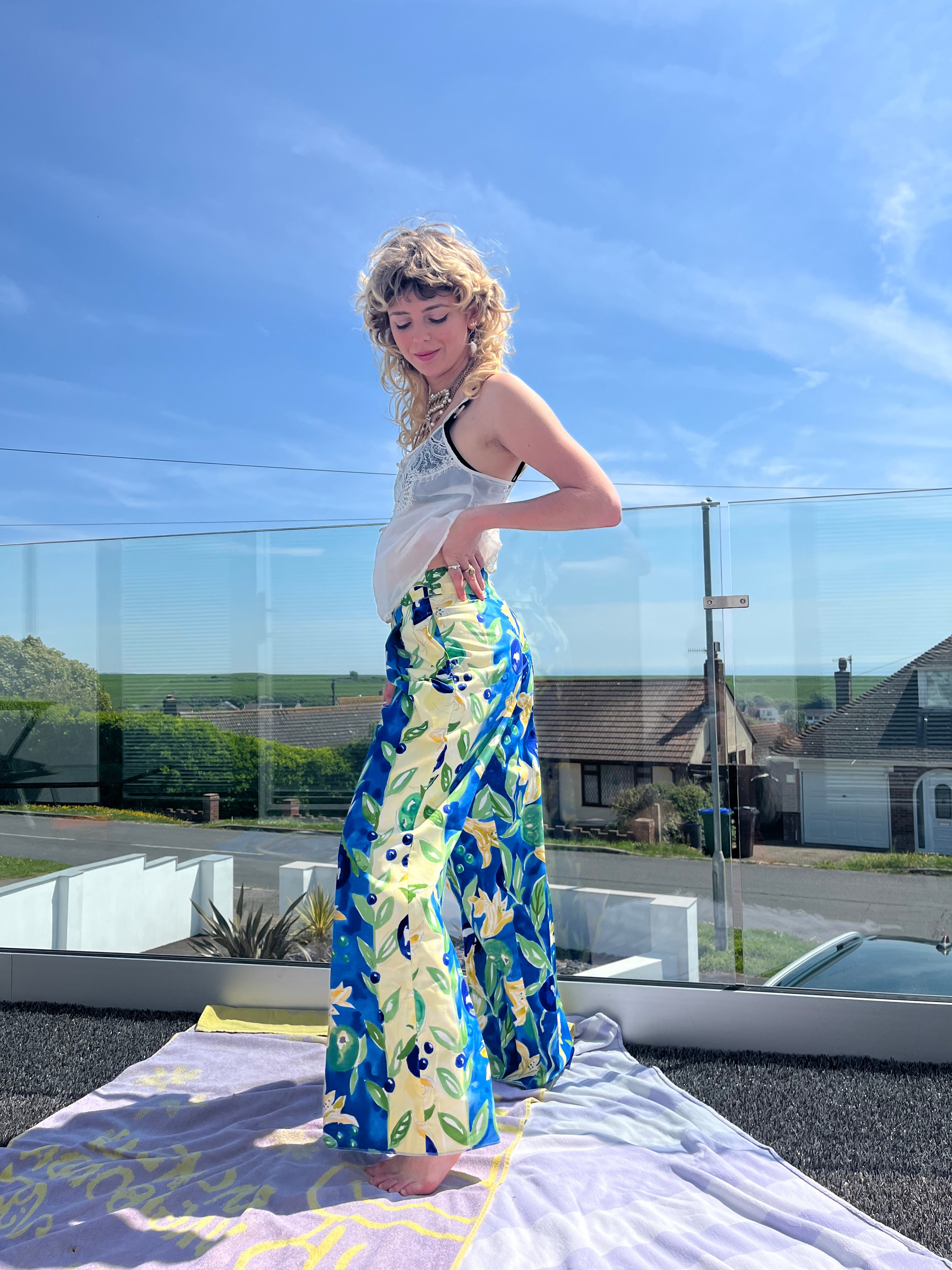 Person wearing a colorful trouser with a reflective surface